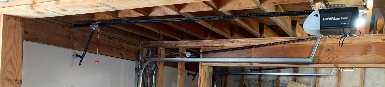 Newly installed sectional garage door with LiftMaster opener in Grayslake IL residential garage