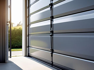 Close-up of a sleek automatic garage door opening, showcasing efficient remote-controlled operation and modern technology.